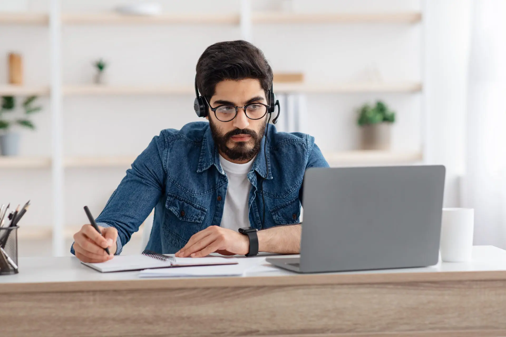 millennial-arab-guy-in-headset-watching-online-web-2022-12-16-06-45-51-utc-scaled millennial-arab-guy-in-headset-watching-online-web-2022-12-16-06-45-51-utc-scaled